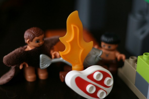 Lego Caveman cooking their Paleo meal over fire