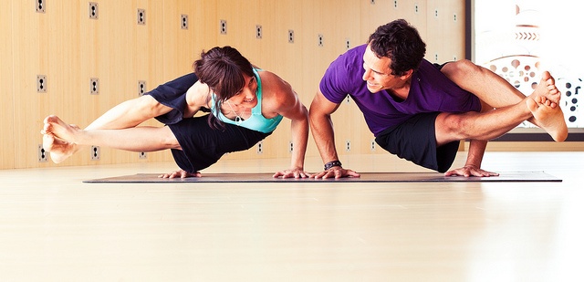 Couple doing yoga