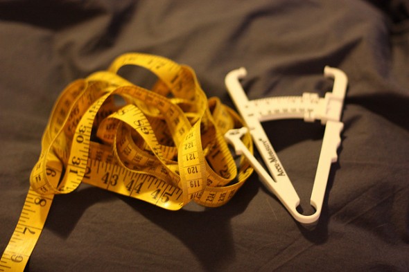 A body fat caliper can help determine fat %.