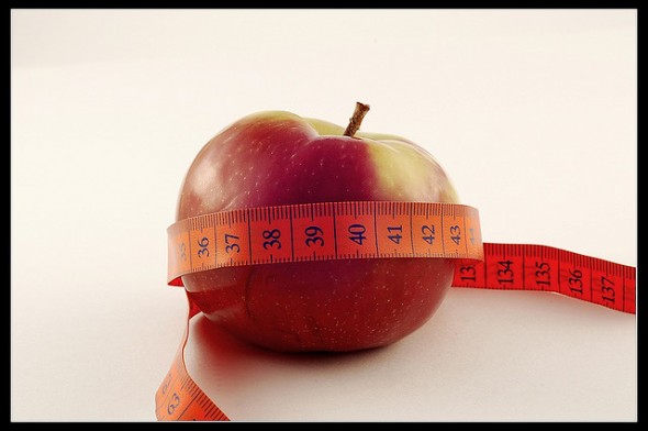 apple and tape measure apple and tape measure