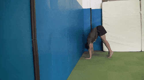 Doing a push-up from a downward dog like position