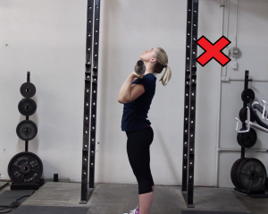 Find a spot on the way, and try and keep your gaze there during your press.