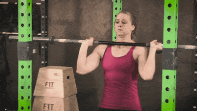 Here Staci is pressing just the bar, a could practice for warming up.