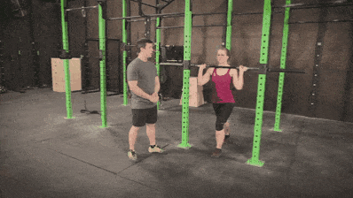 Staci showing you proper form to begin your overhead press.