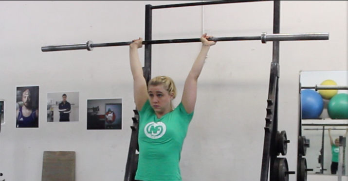 Staci, shown doing the press, will walk you through all you need to master this movement.
