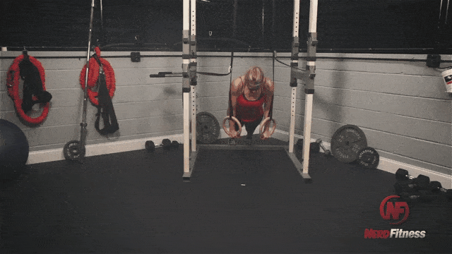 Staci showing you how to complete a push-up using gymnastic rings.