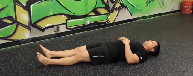 Start by lying on your back like so.