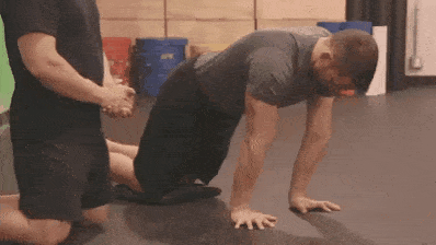 Steve showing you how to do quadruped rocking, a great workout for doing a handstand.