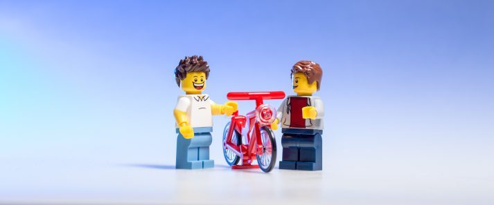 These two LEGOs are discussing how they feel about fat on their chest: man boobs.
