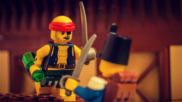 These two LEGOs are fighting over how to reduce man boobs.