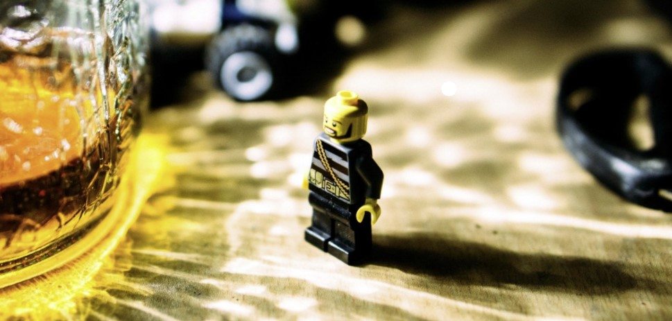 A LEGO and an alcoholic beer