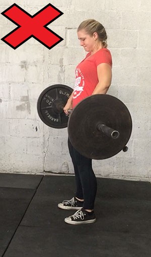 Do NOT bend your arms here like Staci during your deadlift.