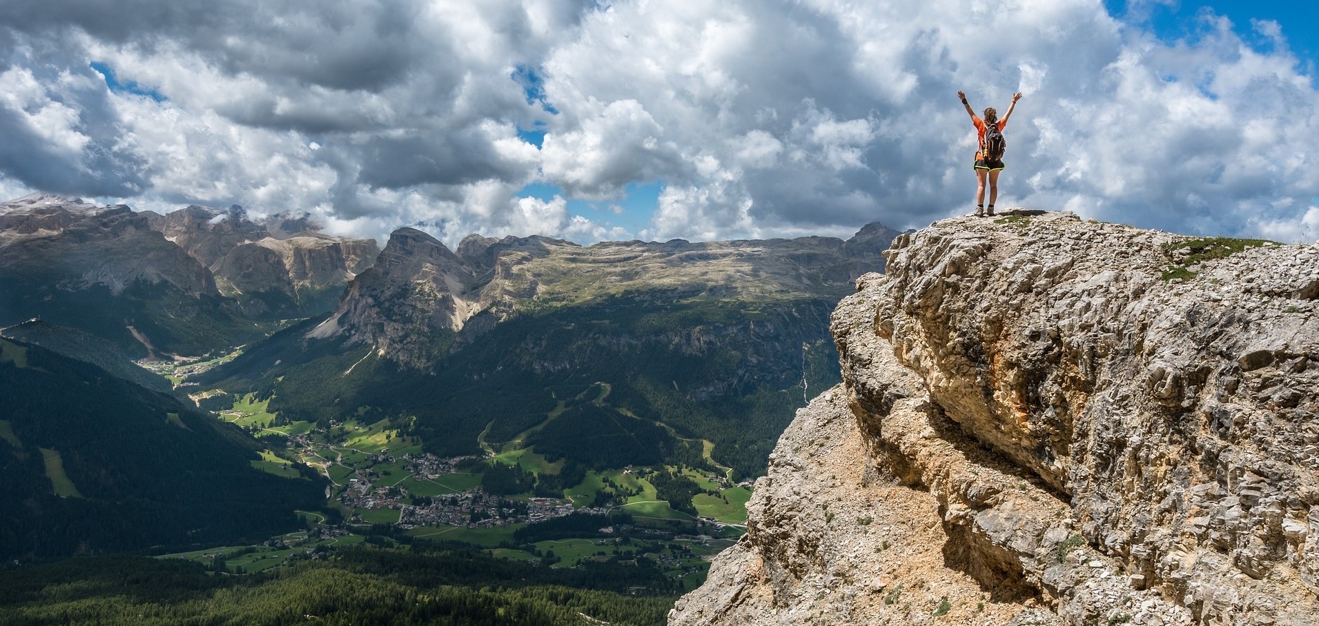 Climbing mountains is a great way to build muscle (man or woman).