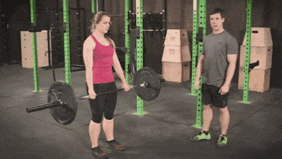 Coach Staci showing the Romanian deadlift