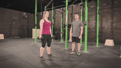 Coach Staci showing you how to do dumbbell cleans