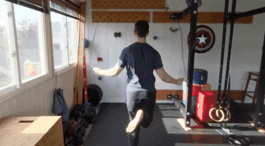 Coach Matt showing you the jump rope butt kicks, which has alternating bringing your foot back as far as you can for every hop.