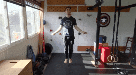 The upper body is doing normal jump rope swings, while the lower body does jumping jacks.