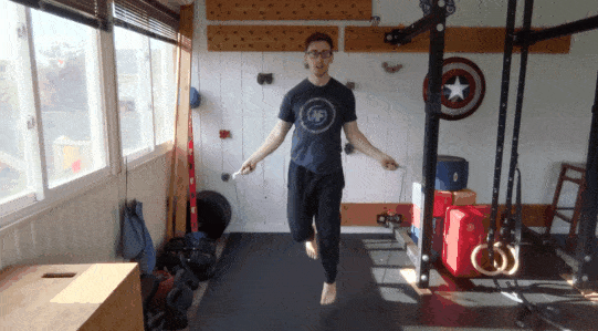 Here, Coach Matt sticks out one leg for every hop with his rope.