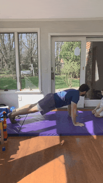 Once at the top of your push-up, have your kid crawl under you, like so.