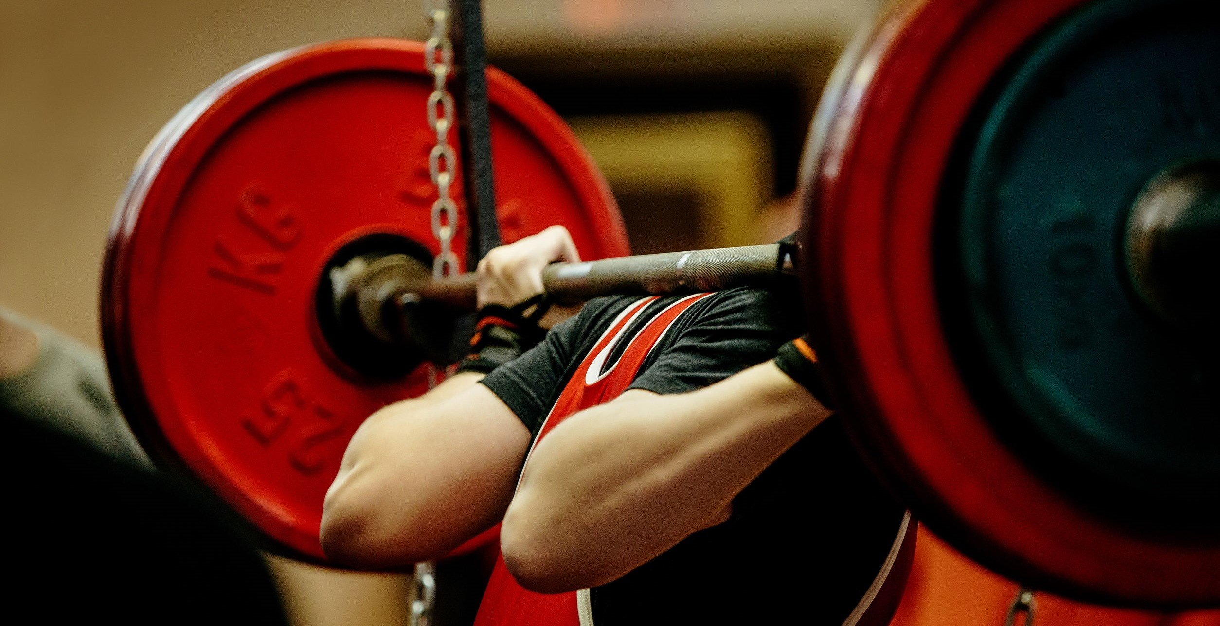 female powerlifter squat barbell for competition powerlifting