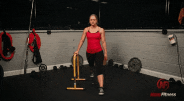 This gif shows Coach Staci doing an assisted split squat, a lunge variation you can try.
