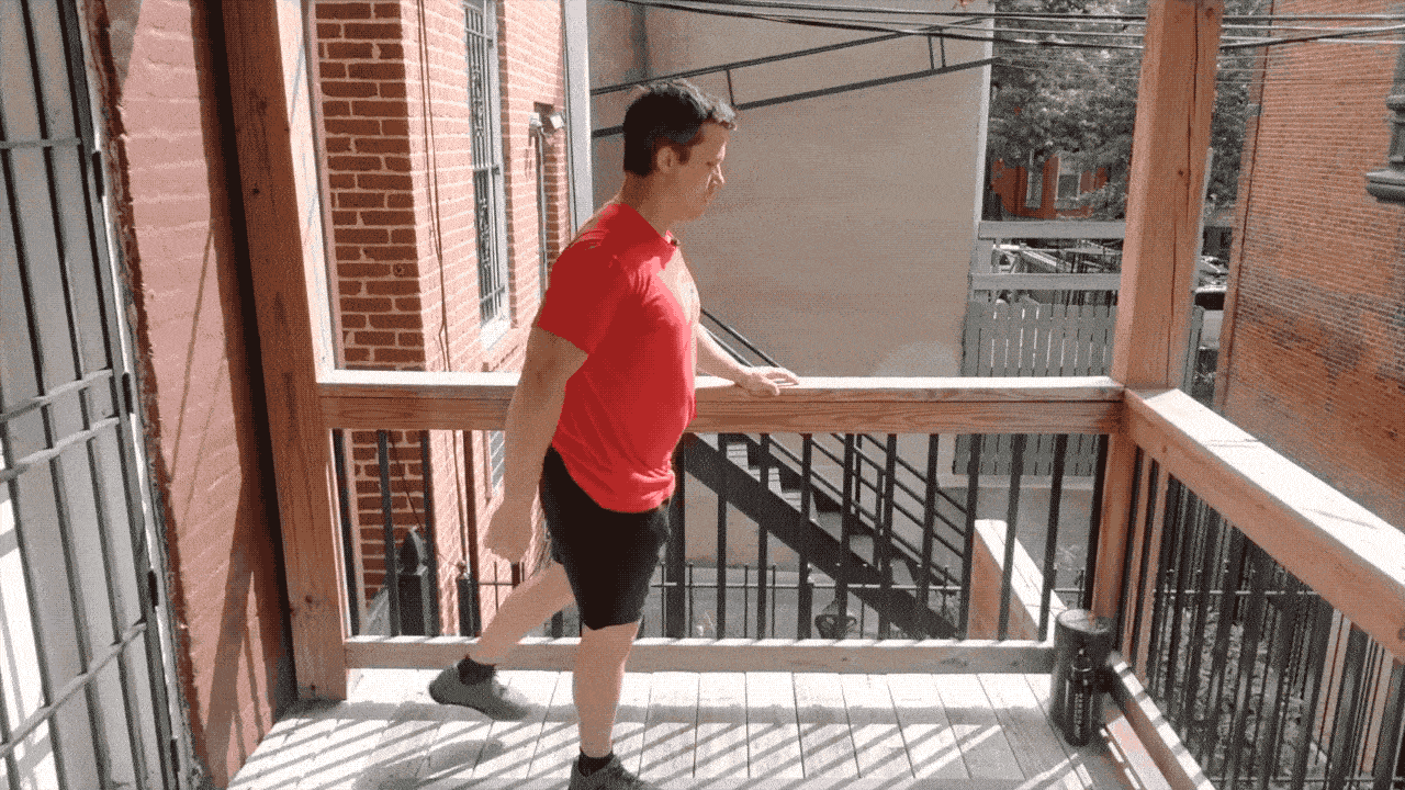 Coach Jim doing a leg swing