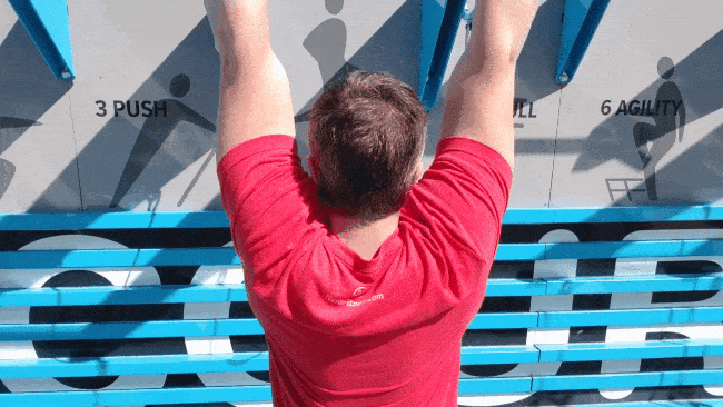 Coach Jim doing a shoulder retract, shown from the back