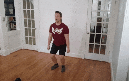 Coach Jim doing cleans with no weights