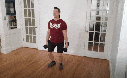 Coach Jim doing cleans with dumbbells