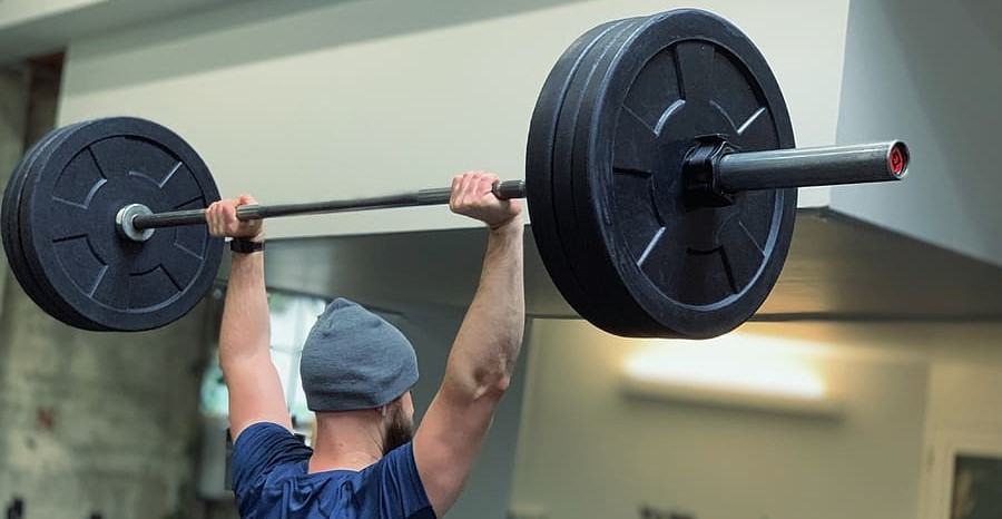 A man doing an Olympic Lift