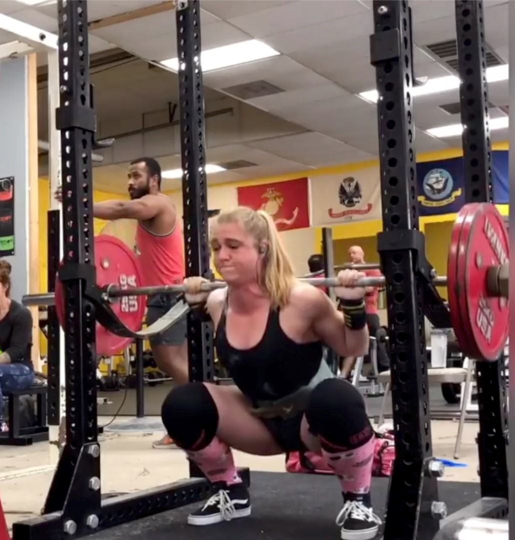 Staci doing a back squat