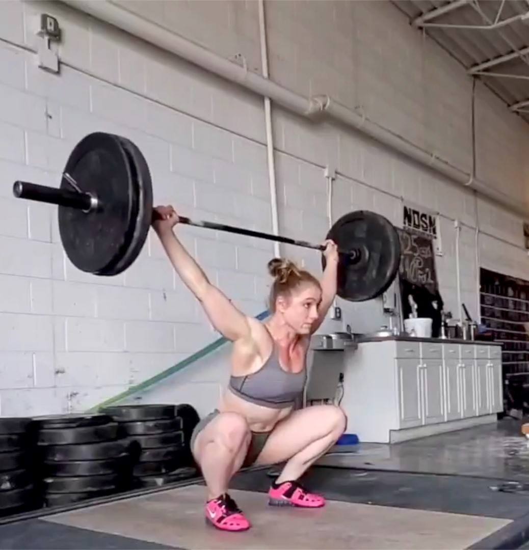 Staci doing an overhead squat