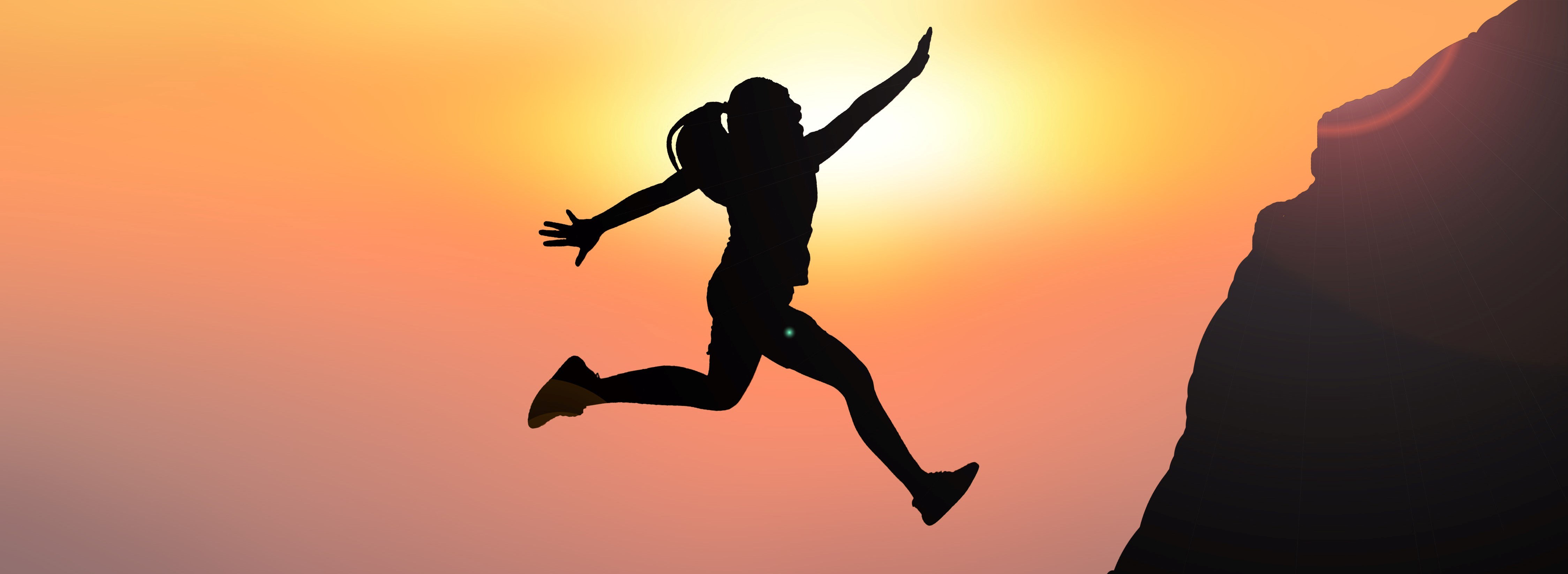 Silhouette women jumping