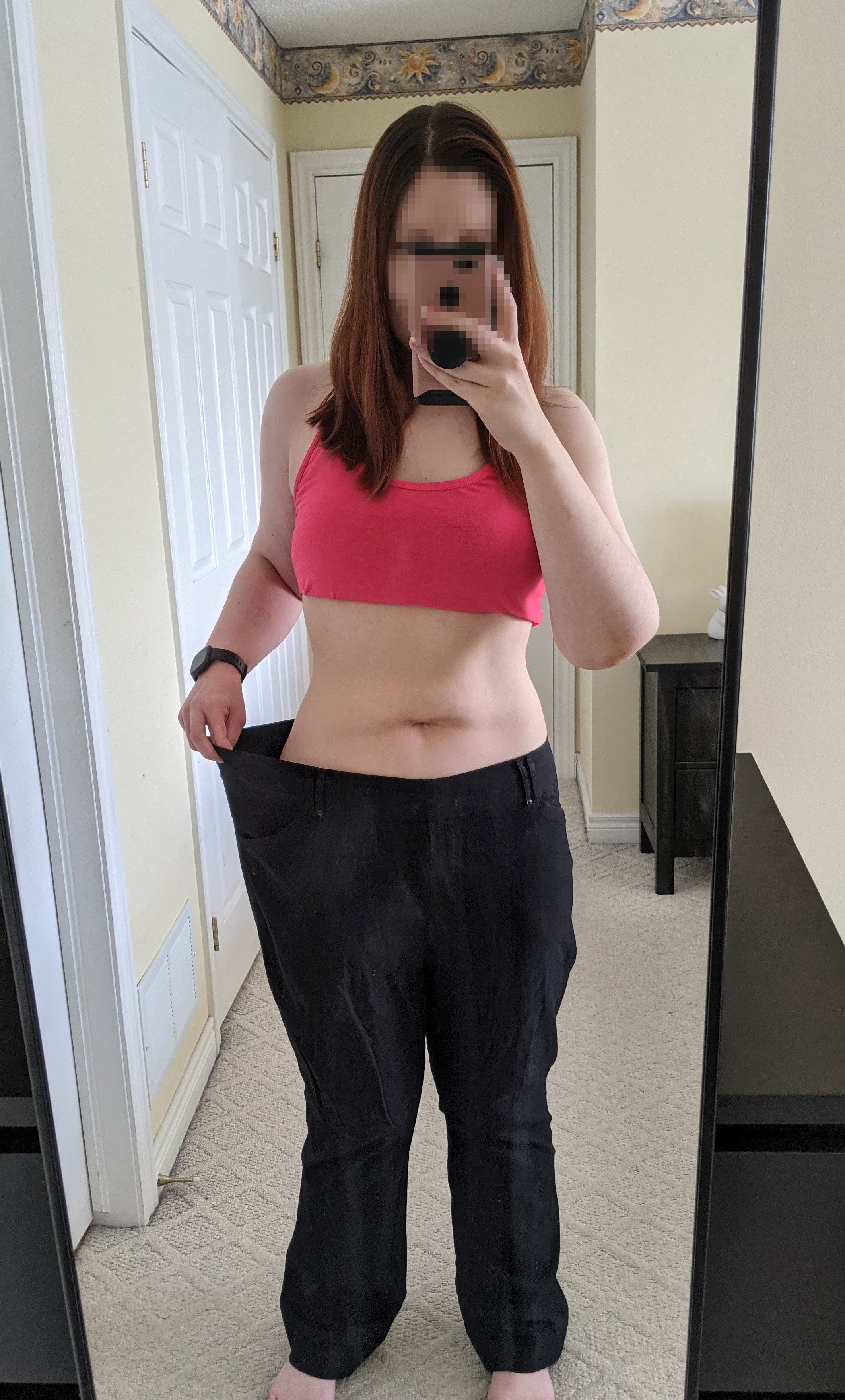 Sarah in her old pants that are too big