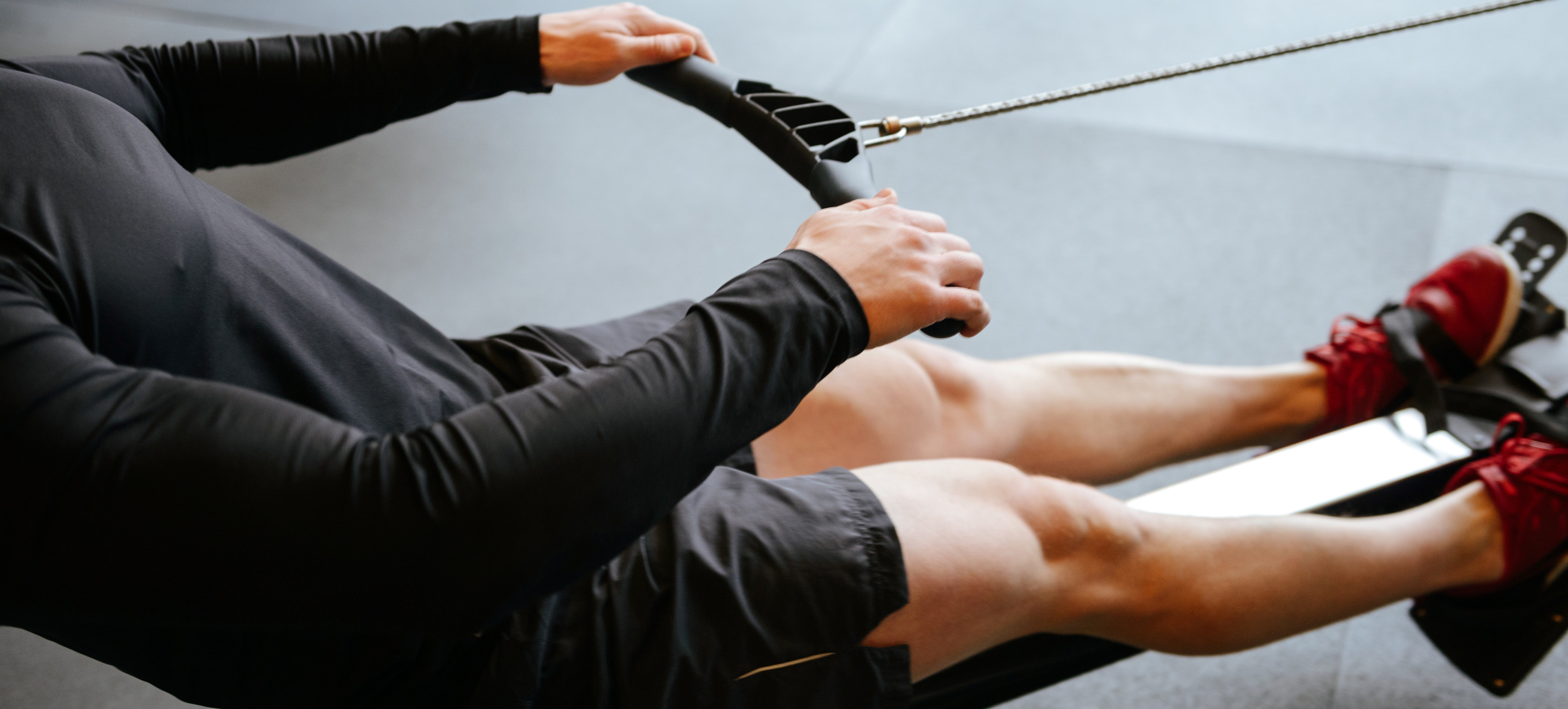 Man using row machine