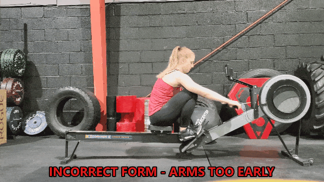 Coach Staci demonstrating incorrect form, pulling arms too early