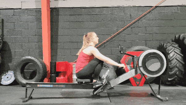 Coach Staci demonstrating drill with legs, body, and arms