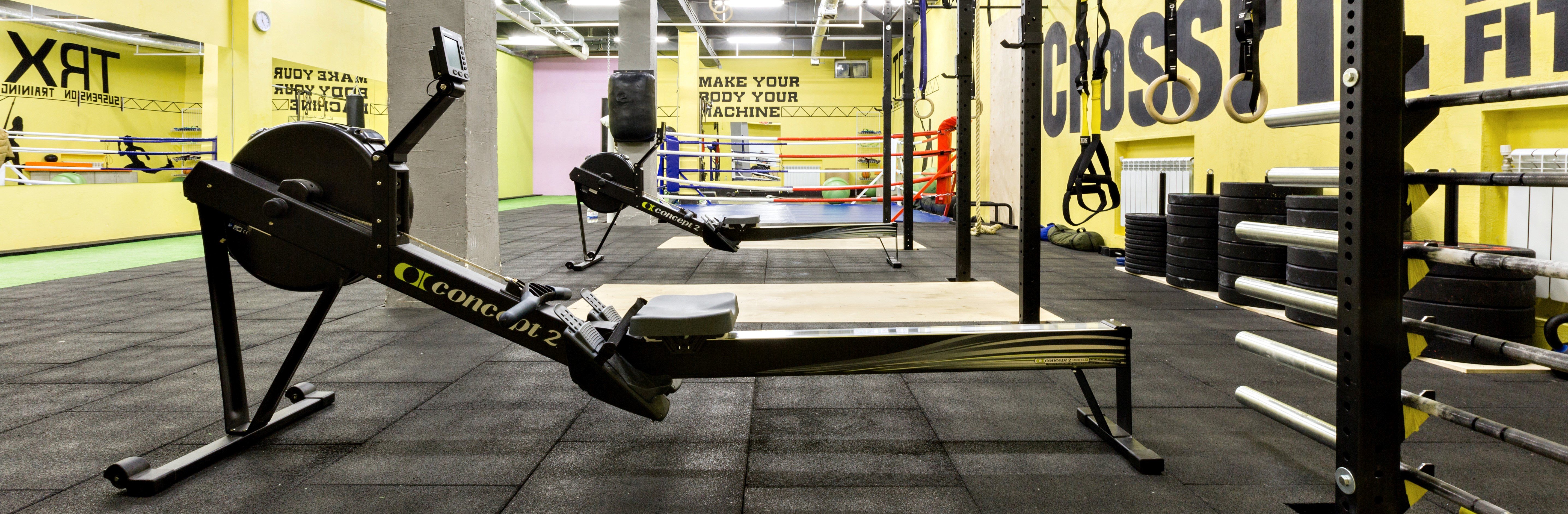 A coupe rowing machines in the gym