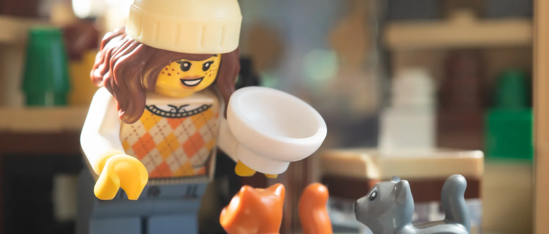 A LEGO feeding her dogs