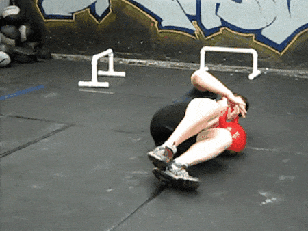 Coach Jim setting up a heavy Turkish Get-up with two hands