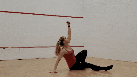 Staci sitting up on her hand, to bridging her hips up and sweeping the leg under, and then reversing it. 