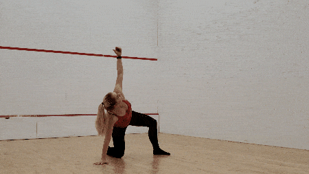 Staci going from foot, knee, and hand on the ground, to getting into a reverse lunge position, then standing up, then reversing it all.