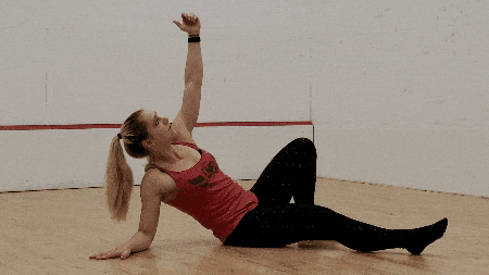 Complete the Turkish Get-up by gently lowering your upper back to the ground. 