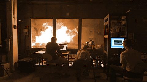 Scientist watching a lab fire