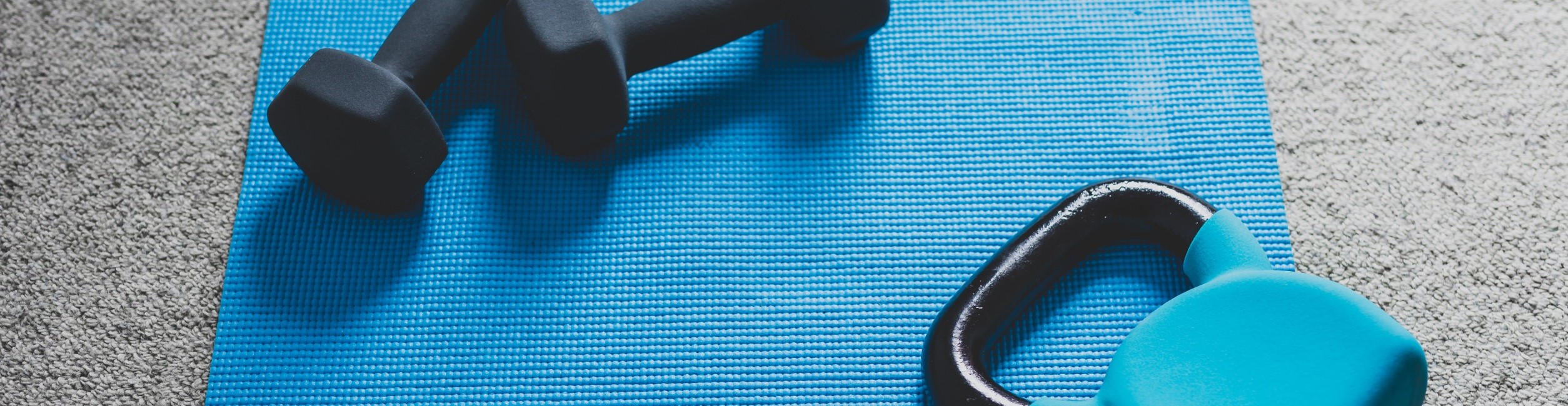 A workout mat with weights on it